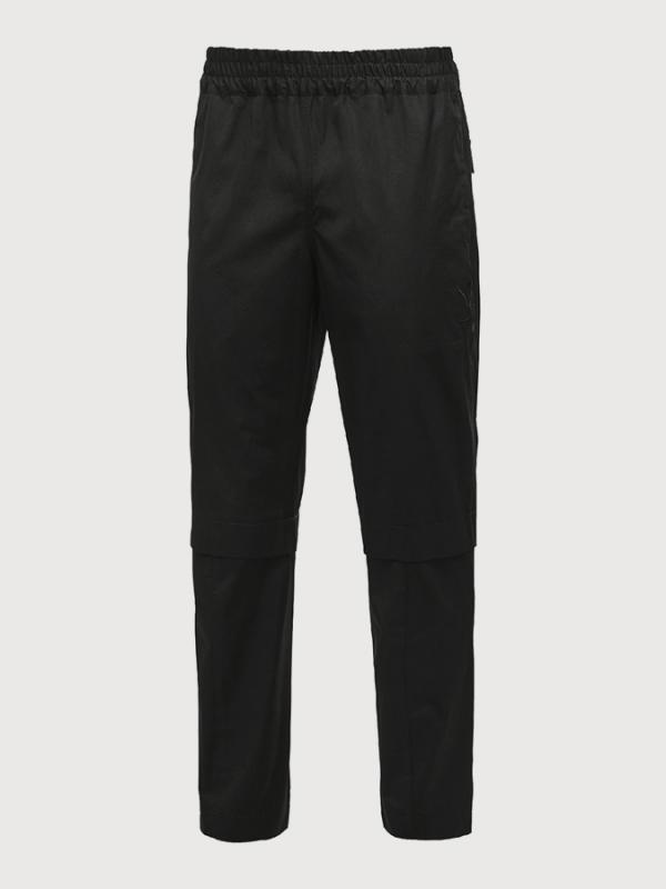 Tepláky Puma x XO Woven Pants Černá