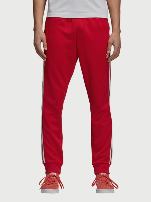 Tepláky adidas Originals Sst Tp Červená