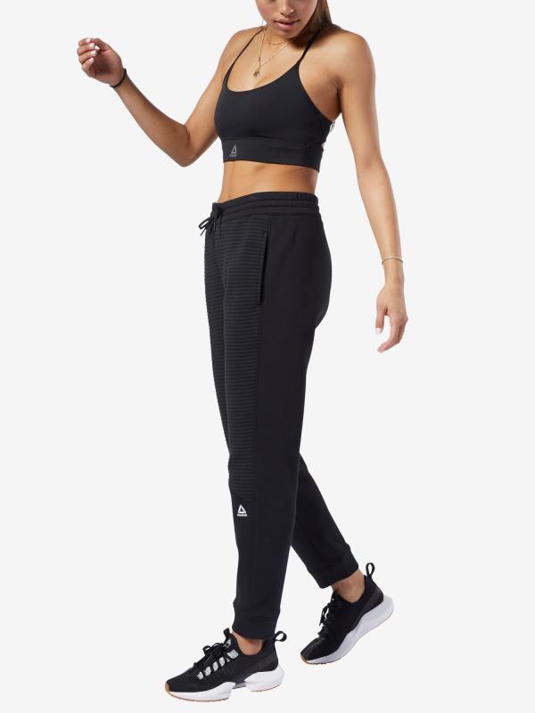 Tepláky Reebok WOR Versatile Pant Barevná