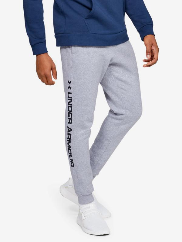 Tepláky Under Armour RIVAL FLEECE WORDMARK LOGO JOGGER-GRY Šedá