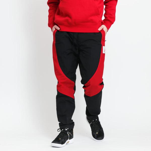 Šusťáky Jordan M J Flight Suit Pant černé / červené