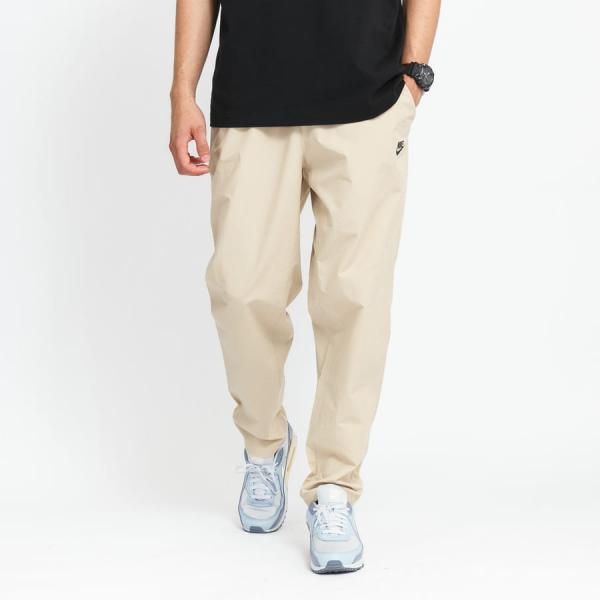 Šusťáky Nike Sportswear Woven Pant Seasonal Beige