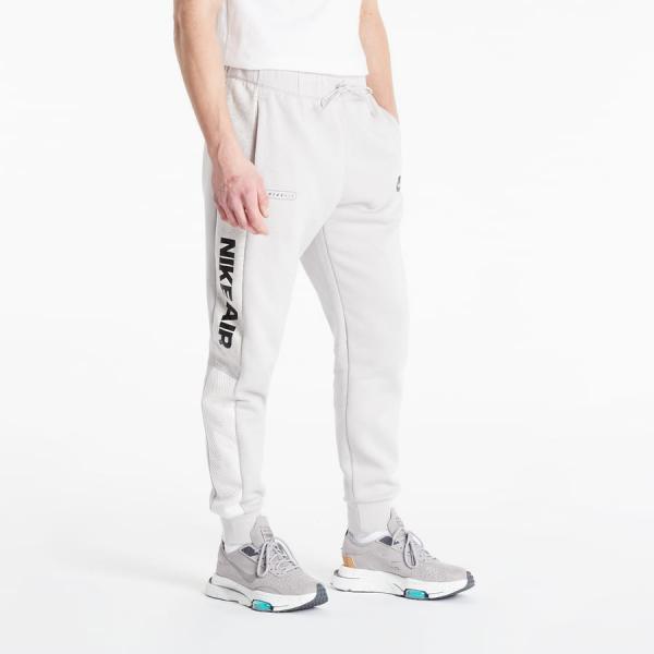 Kalhoty Nike Air Brushed Back Joggers šedé
