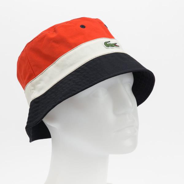 Klobouk LACOSTE Lightweight Reversible Colourblock Bob navy / červený / krémový