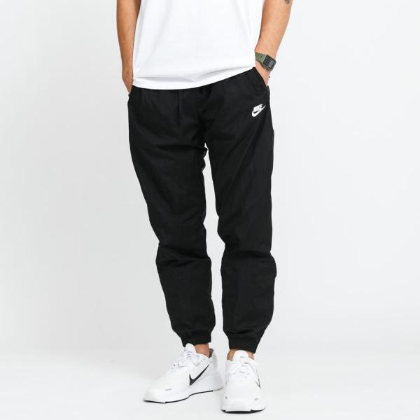 Šusťáky Nike M NSW Spe Woven Track Pant černé