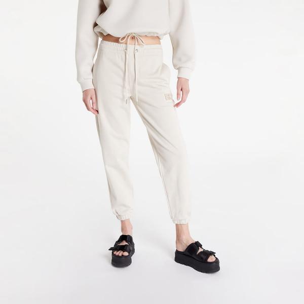 Tepláky CALVIN KLEIN JEANS Badge Cuffed Jogger Pants Eggshell