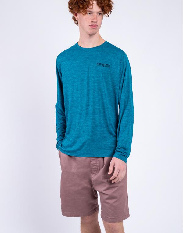 Tričko Patagonia M's L/S Cap Cool Daily Graphic Shirt - Lands Tree Trotter: Belay Blue X-Dye
