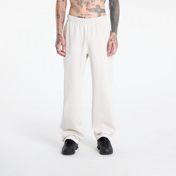 Tepláky Nike x NOCTA Fleece CS Open-Hem Sweatpants Lt Orewood Brn/ Lt Orewood Brn/ Team Red S