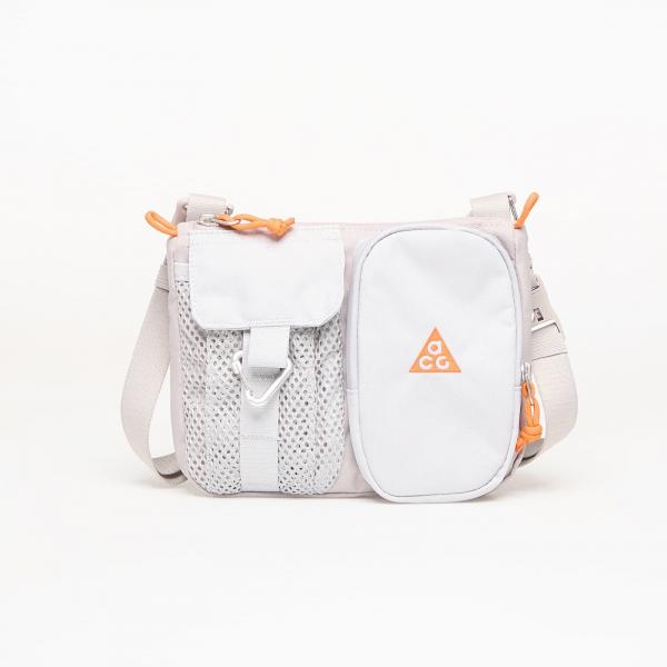 Taška Nike ACG "DAYMAX" Crossbody Bag 3L College Grey/ Grey Fog/ Safety Orange Universal