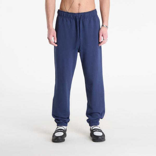 Tepláky New Balance Athletics French Terry Jogger Navy M