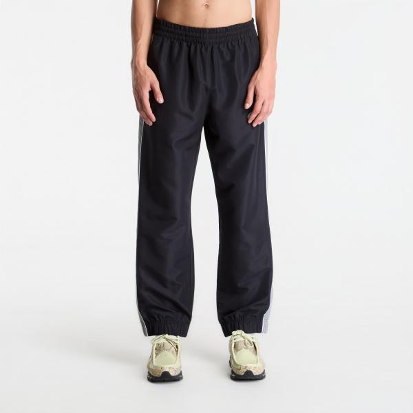 Kalhoty New Balance Trackside Woven Pant Black/ Slate Grey L