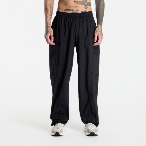 Tričko Under Armour Unstoppable Woven Pants Solid Ultimate Black XL