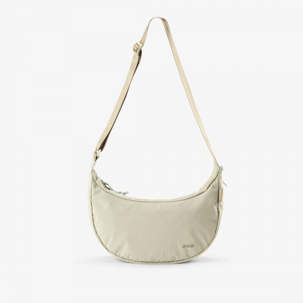 Taška AEVOR Sling Bag Off-White 0,9 l