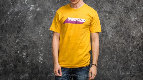 Undefeated Cast Tee Gold